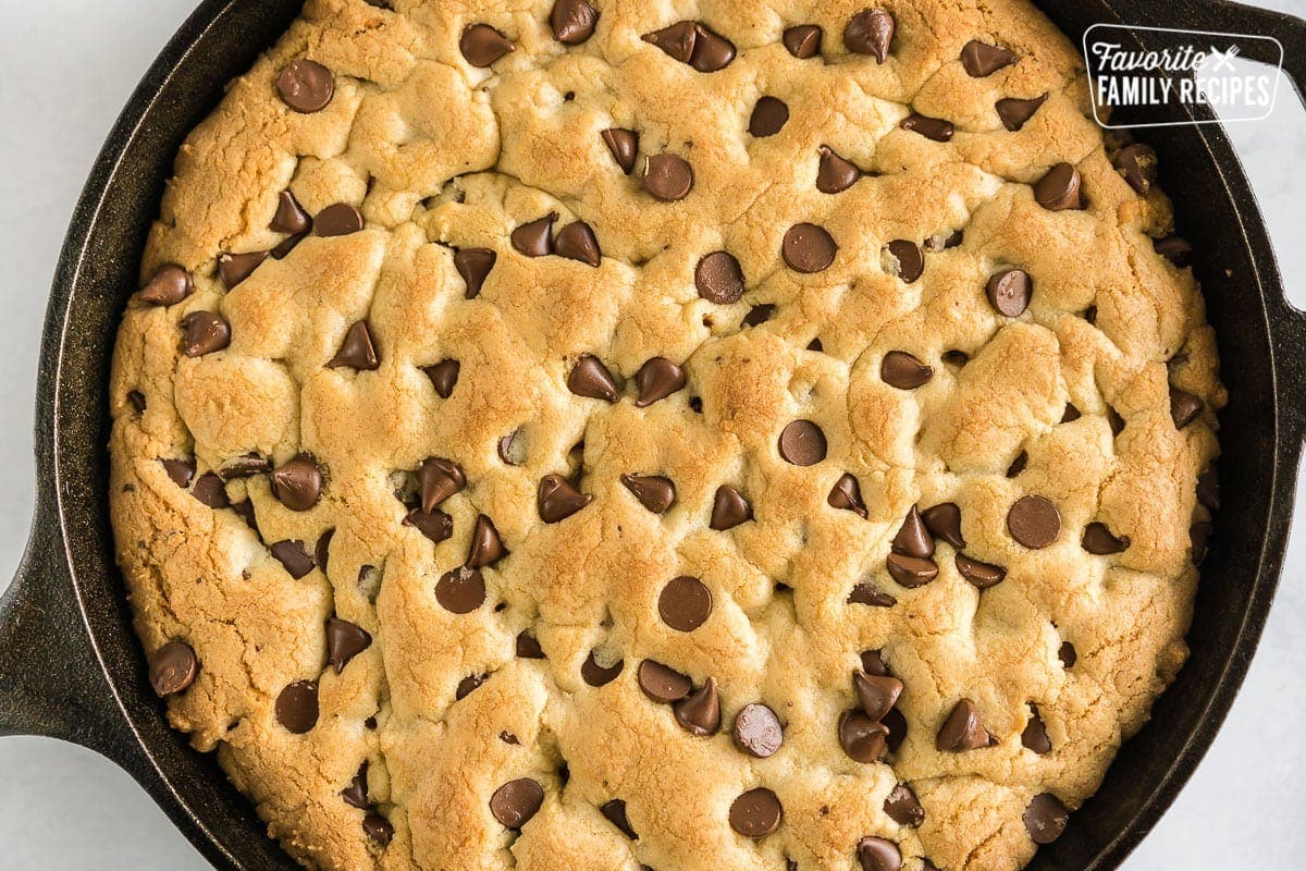 A skillet cookie in a cast iron pan.