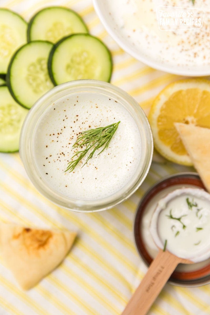 Tzatziki Sauce in jar with pita and cucumber (how to store)