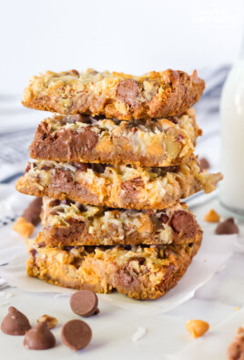 Tall stack of 7 Layer Magic Cookie Bars.