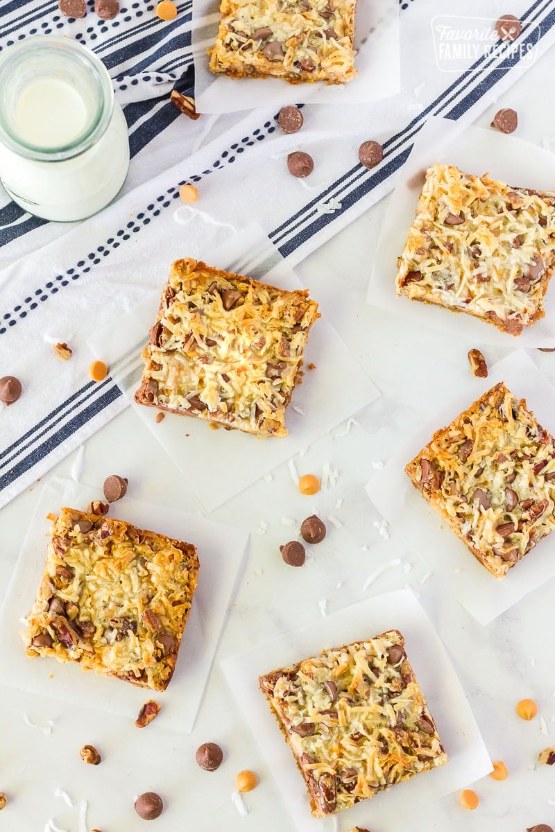 Multiple squares of 7 Layer Magic Cookie Bars.