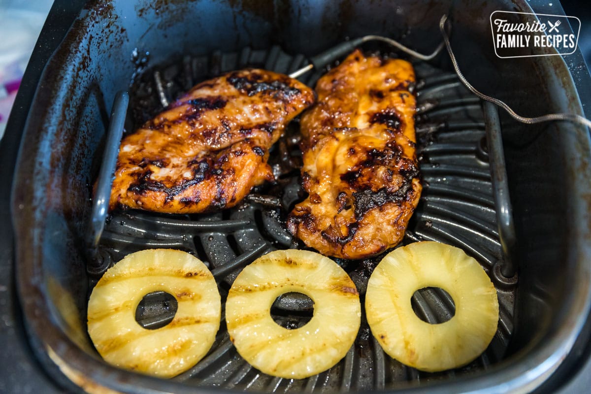 Chicken and pineapple on an grill