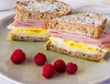 Close up of Breakfast Monte Cristo Sandwich layers.