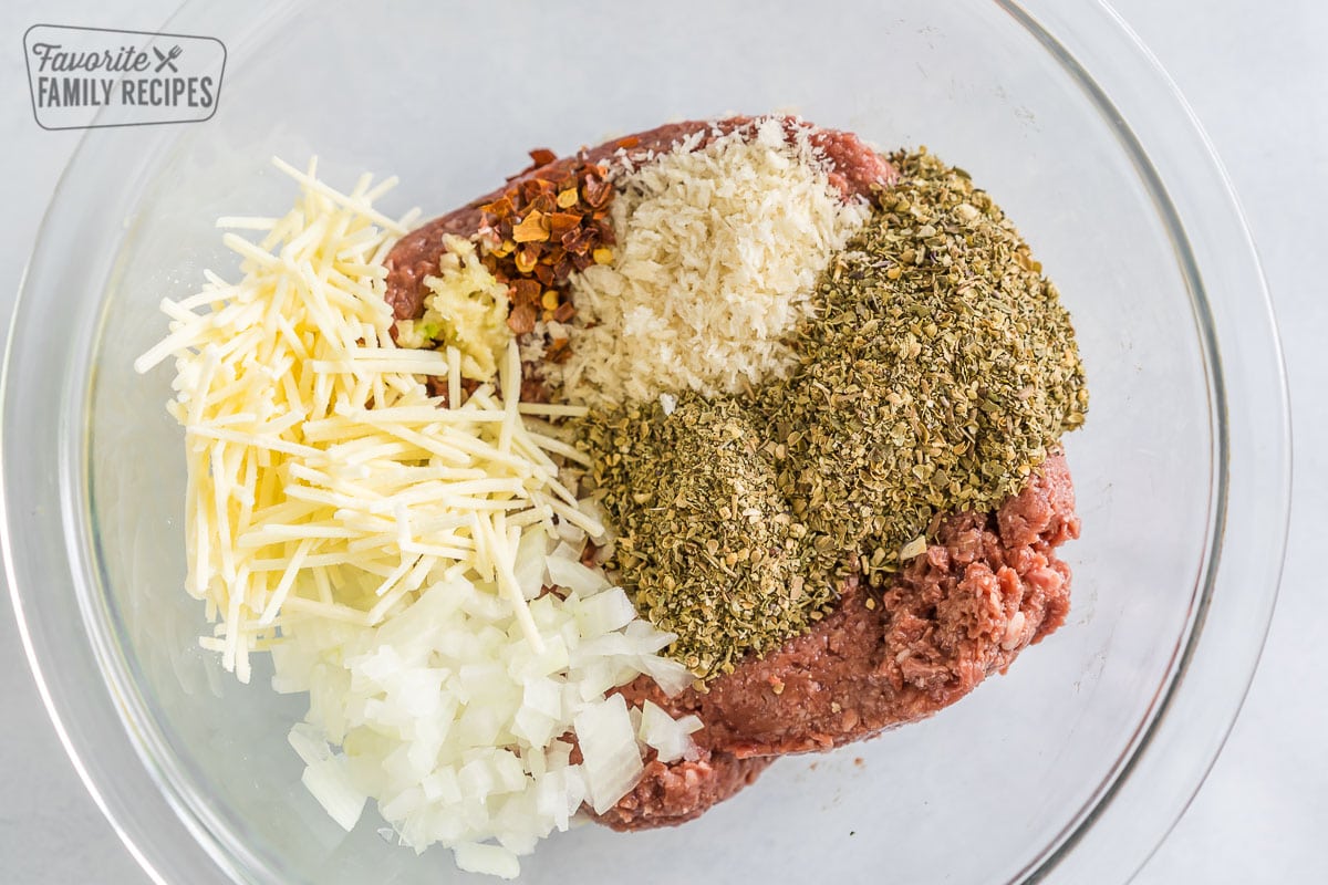 Impossible Meat, seasonings, and breadcrumbs in a bowl