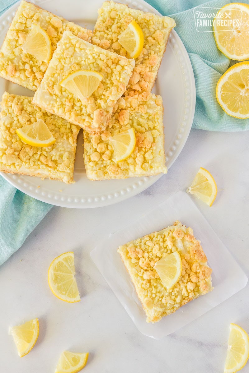 Lemon Cream Cheese Bars on a plate with a single bar to the side.