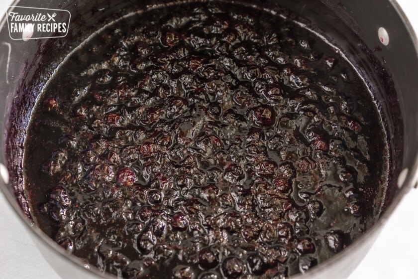 Cooked blueberries in a large pot