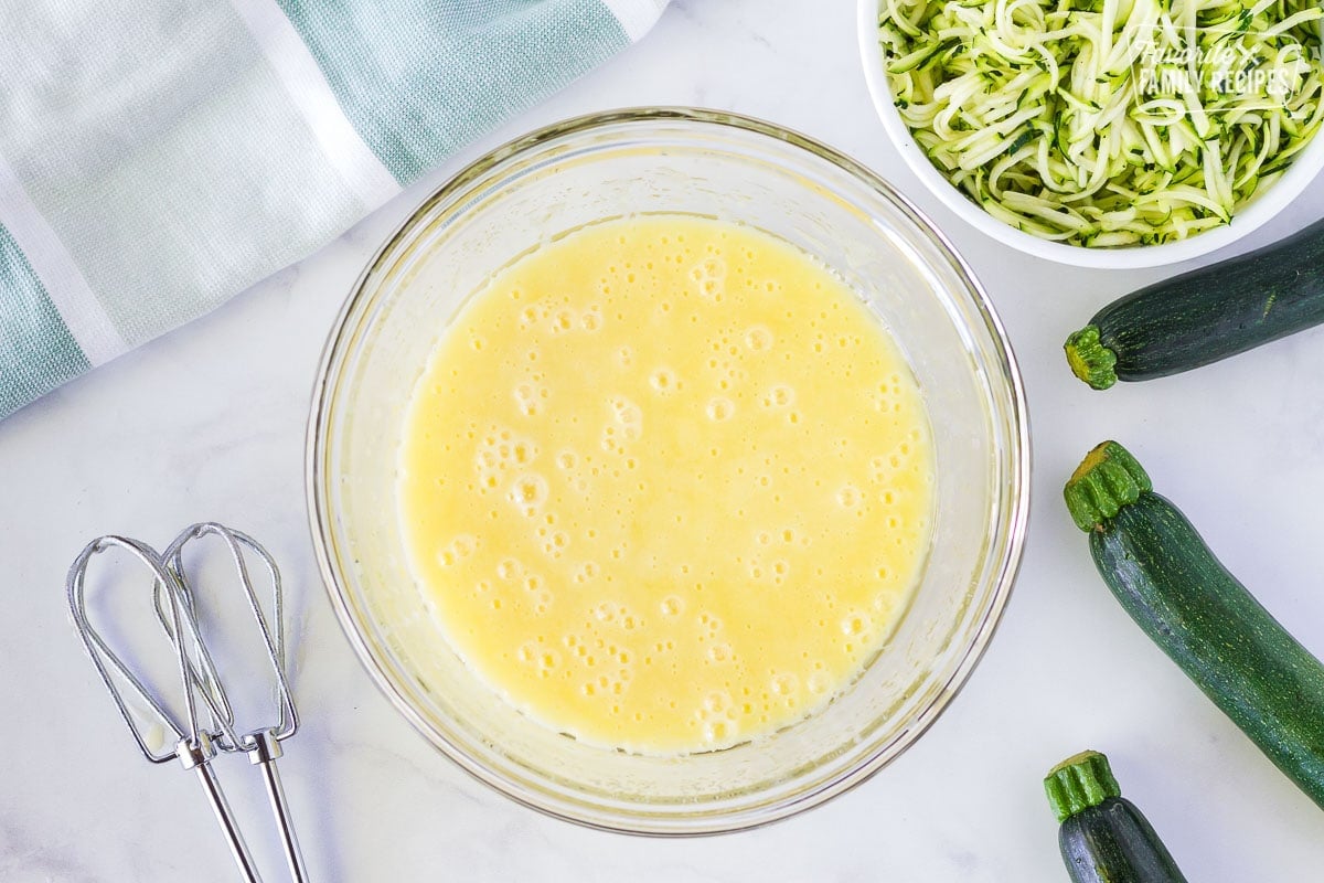 Bowl of mixed wet ingredients for Mom's Zucchini Bread.