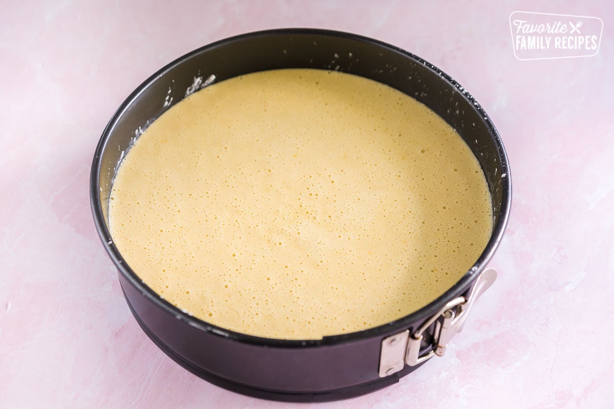 Olive Oil Cake batter in a springform pan