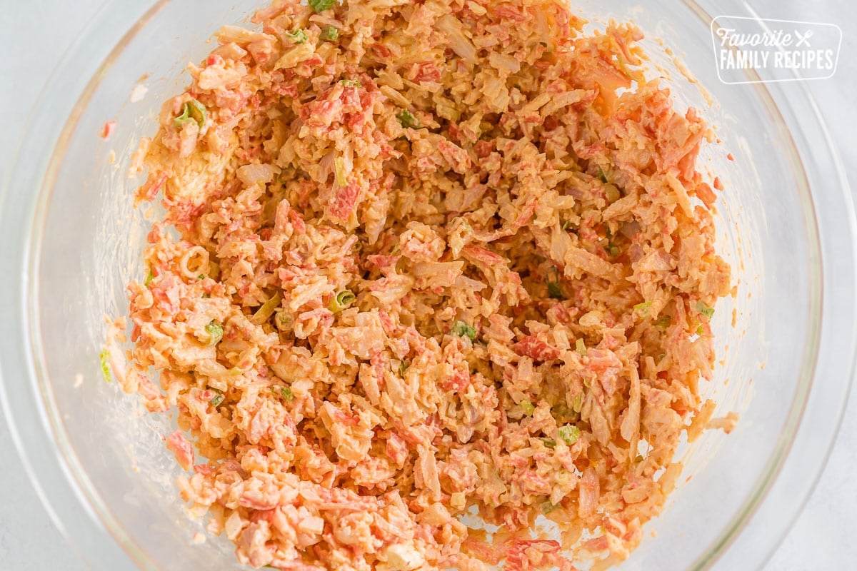 Imitation crab meat mixed with cream cheese, sriracha, kewpie mayo, green onion, and wasabi