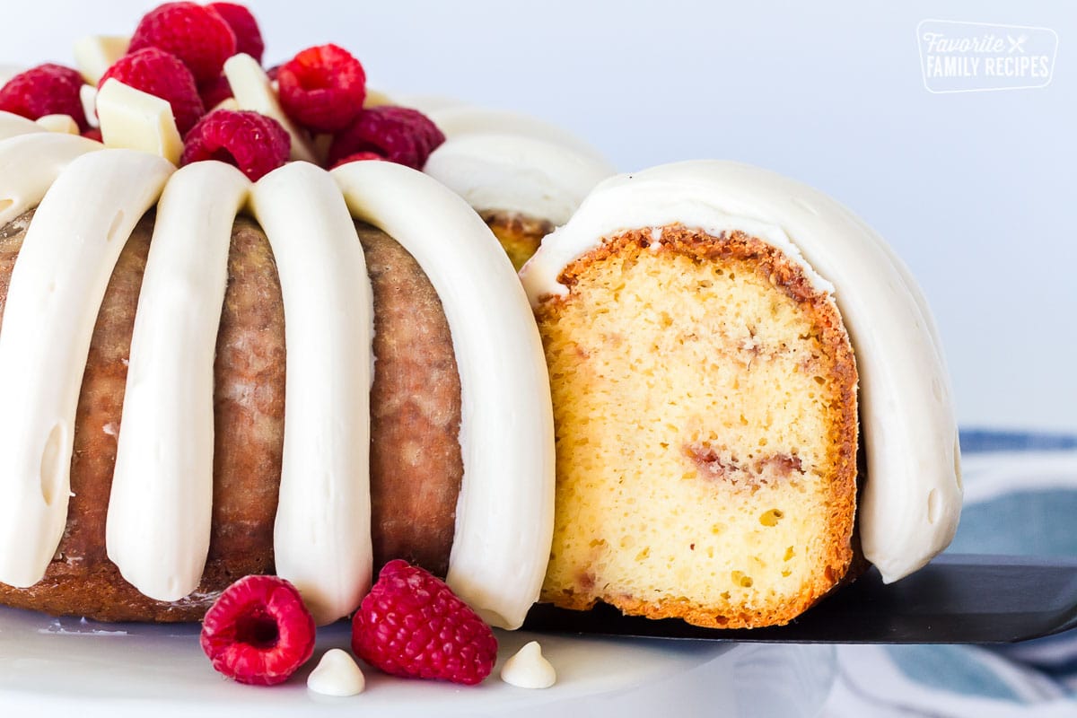 Cut out slice of White Chocolate Raspberry Cake.