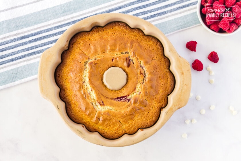 Baked White Chocolate Raspberry Cake in a Bundt pan.
