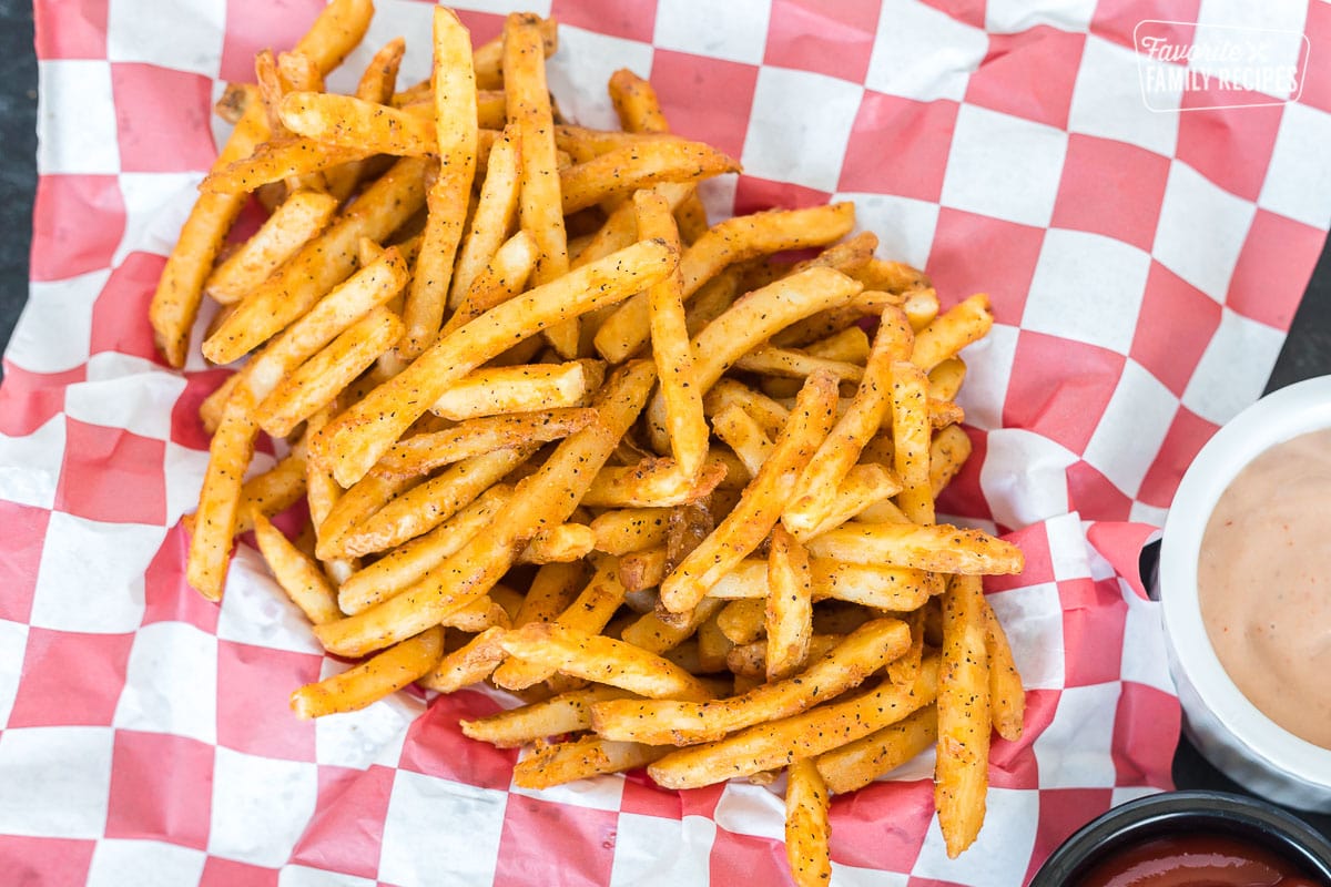 A basket of French fries cooked in the air fryer
