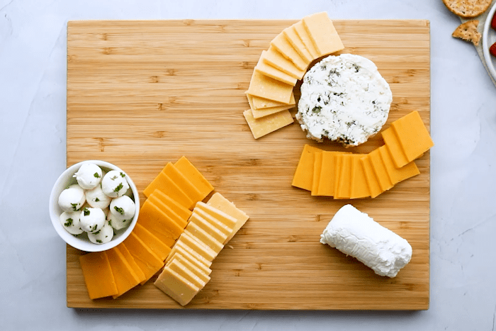 Cheese arranged on a Charcuterie Board.