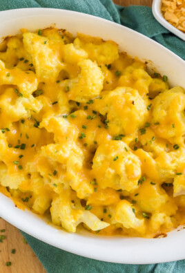 Cheesy Cauliflower side dish cooked in an oval baking dish