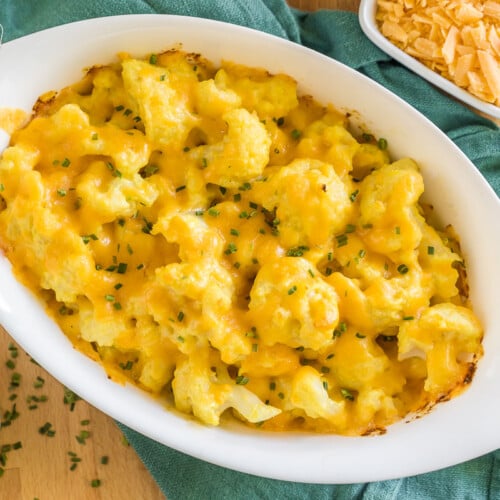Cheesy Cauliflower side dish cooked in an oval baking dish