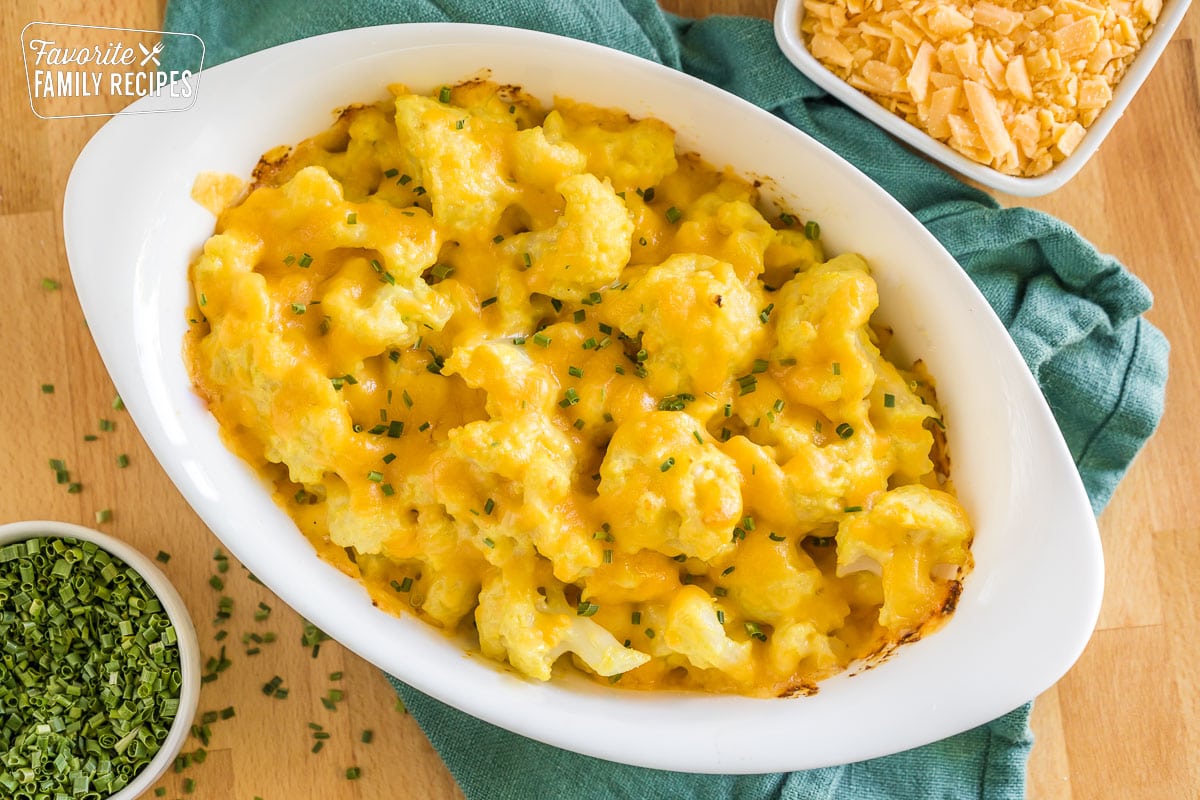 Cheesy Cauliflower side dish cooked in an oval baking dish