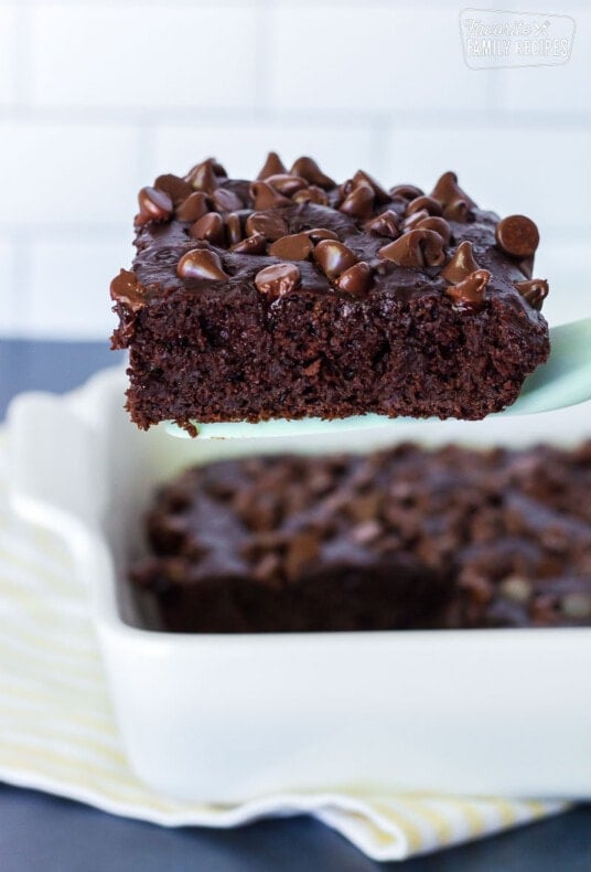 Spatula of Chocolate Pudding Cake coming out of the dish.