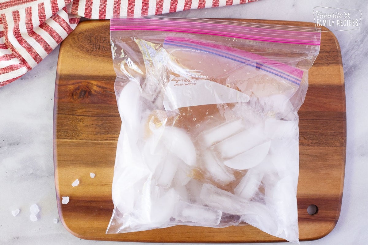 Bag of ice with bag inside of Frozen Butterbeer mixture.