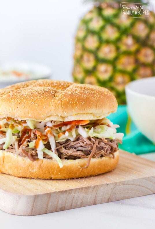 Kalua Pork Sandwich on a cutting board.