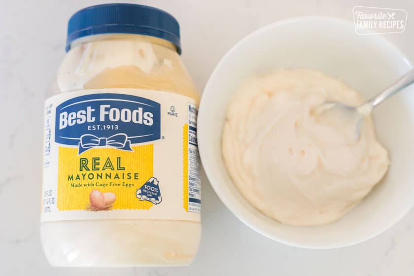 A jar of Best Food's mayonnaise next to a bowl of mayonnaise