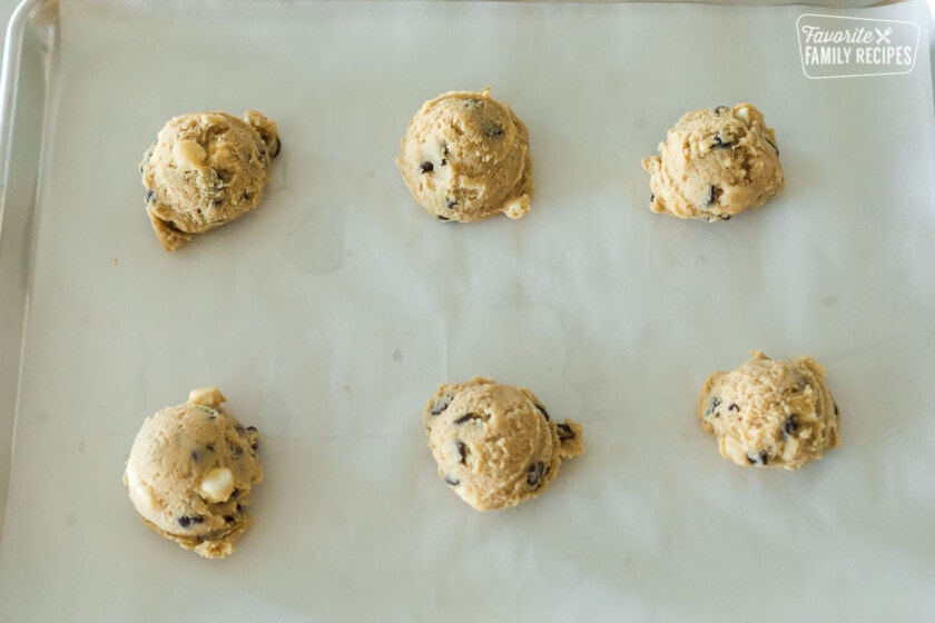 A baking sheet with s'mores cookie dough balls