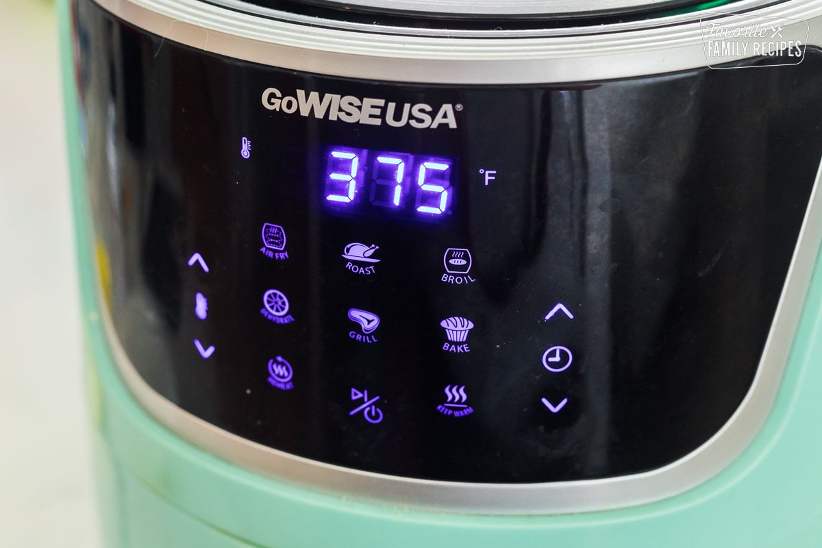 An air fryer showing the temperature at 375-degrees F
