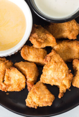 Chicken nuggets that have been air fried and are golden brown