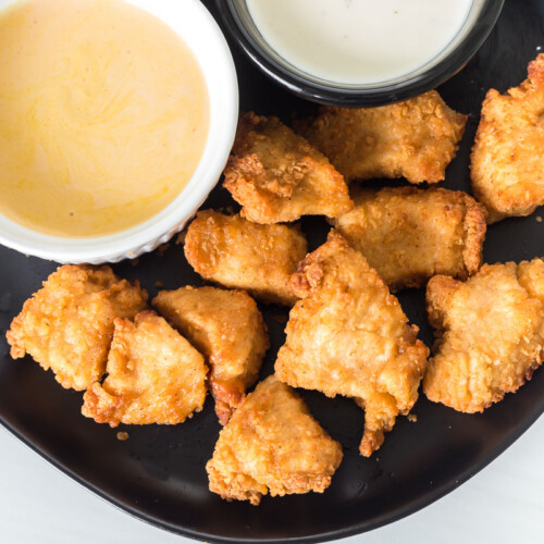 Chicken nuggets that have been air fried and are golden brown