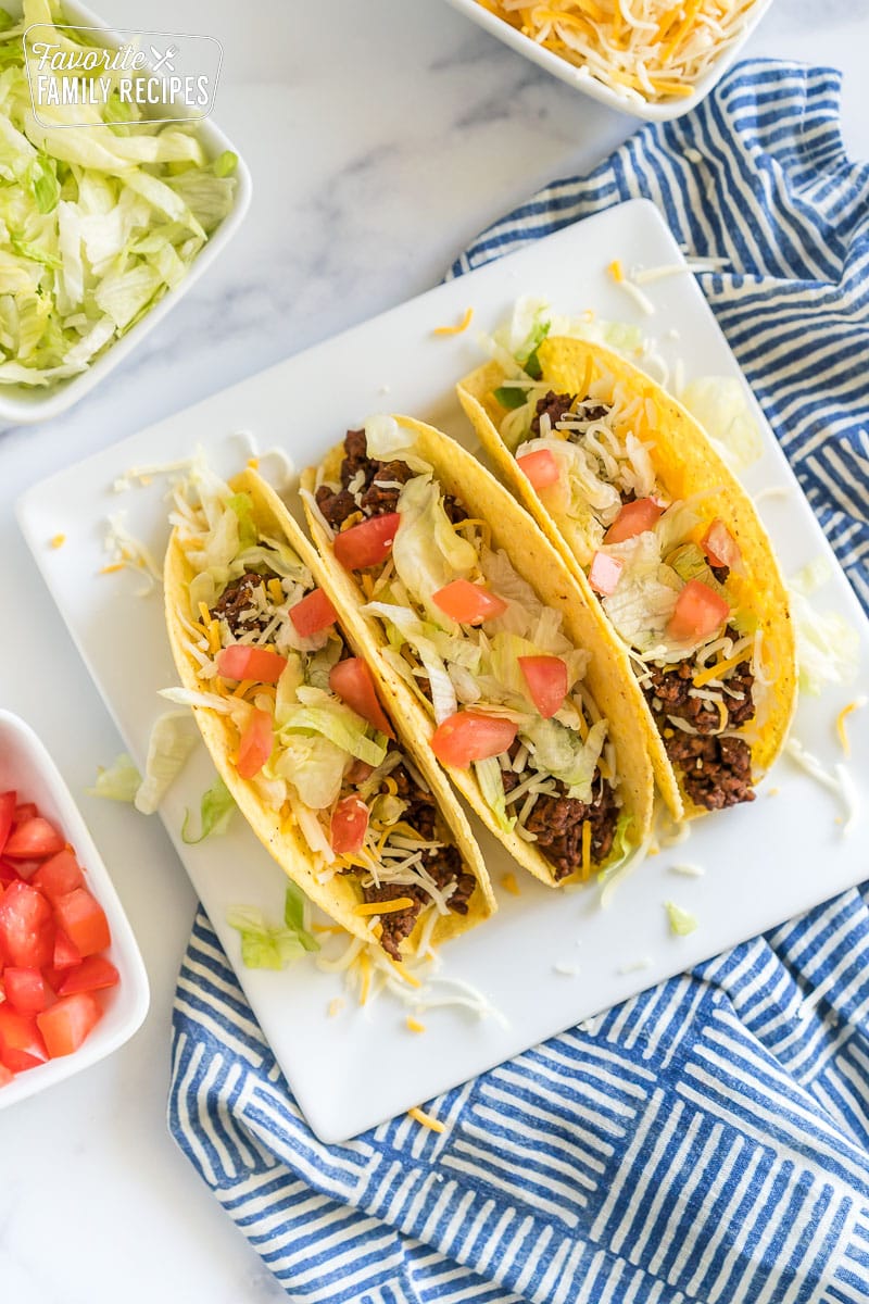 Ground beef tacos on a plate.