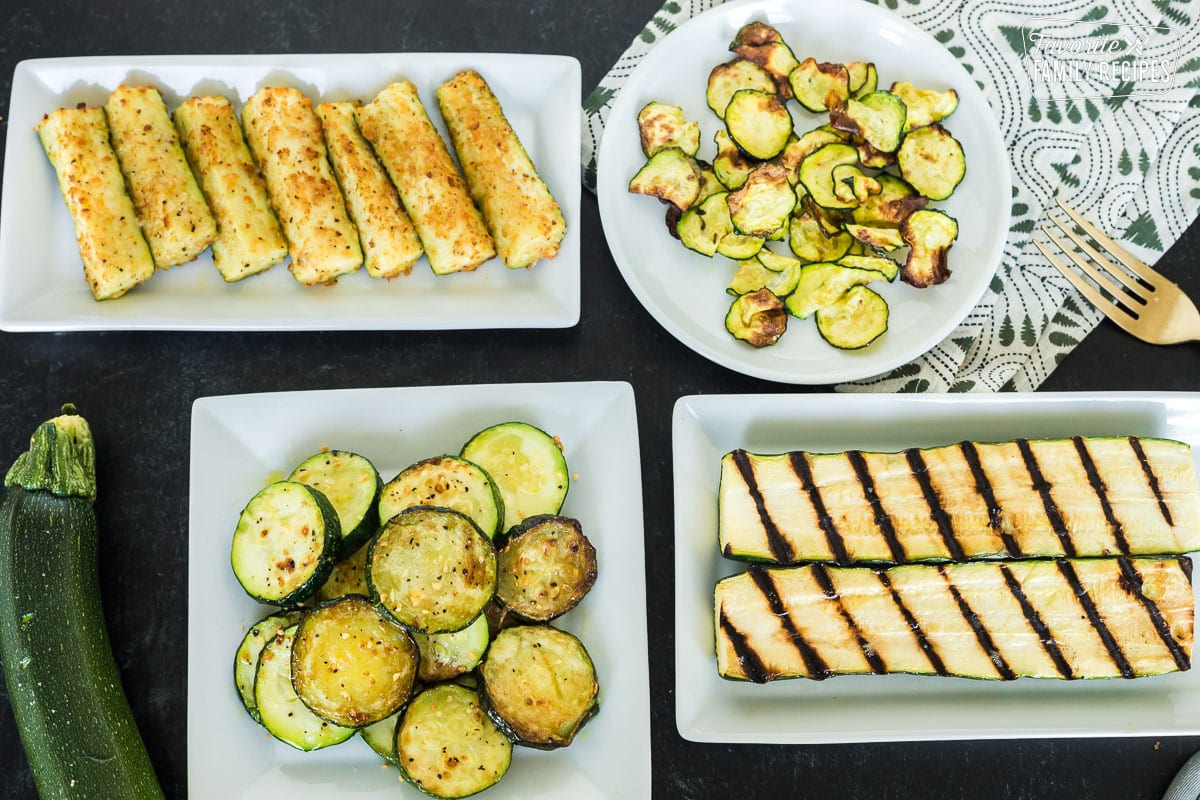A horizontal view of cooked zucchini on different plates.