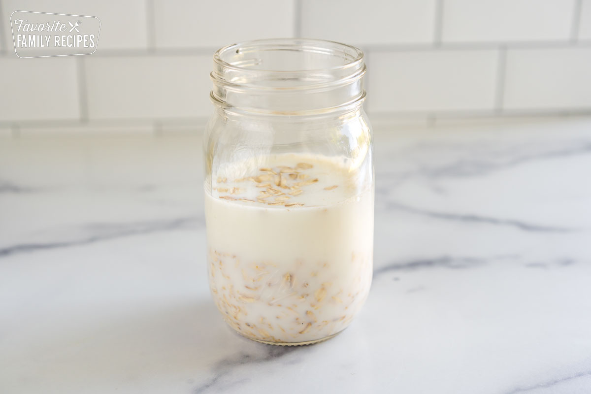 A mason jar with overnight oats.