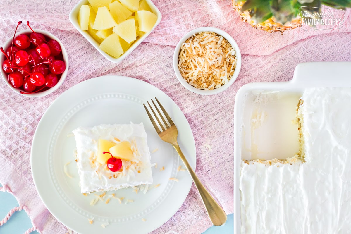 Top view of Pina Colada Cake with garnishes on the side.