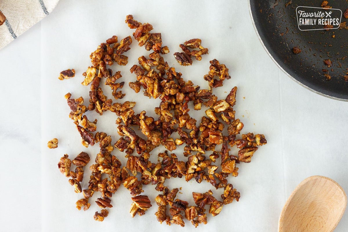 Candied Pecans on parchment paper for Pumpkin Pancake topping.