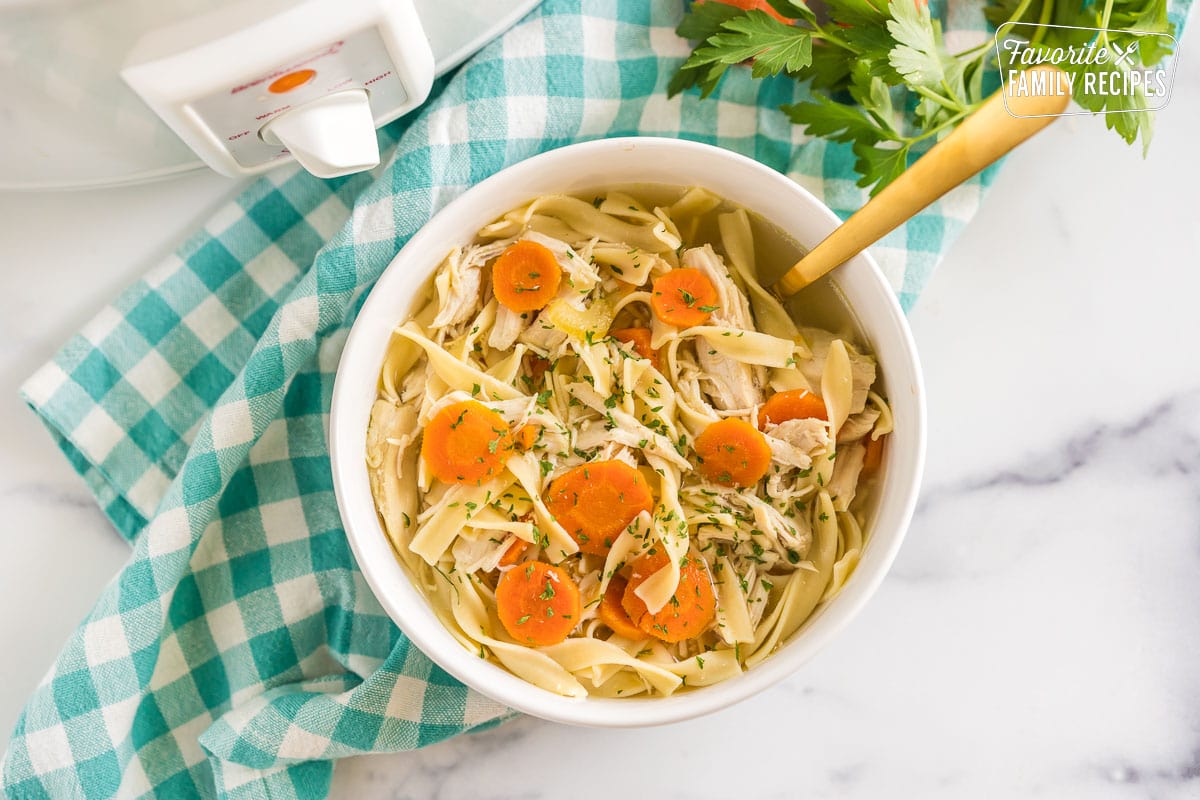 Chicken Noodle Soup that has been cooked in a crockpot