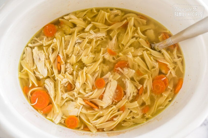 Chicken Noodle Soup that has been cooked in a crockpot