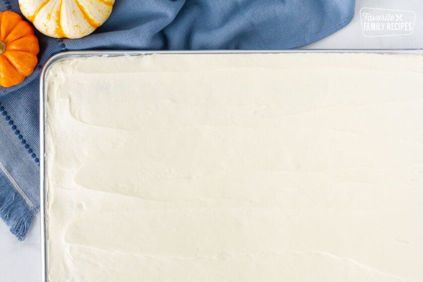 Sheet pan of frosted Pumpkin Sheet Cake.