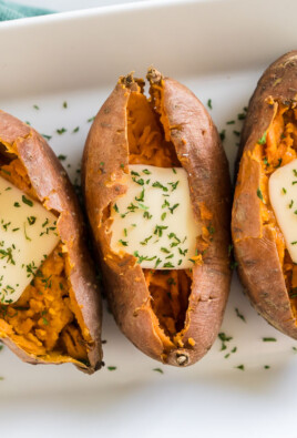 Sweet Potatoes baked in the instant pot with butter on a plate