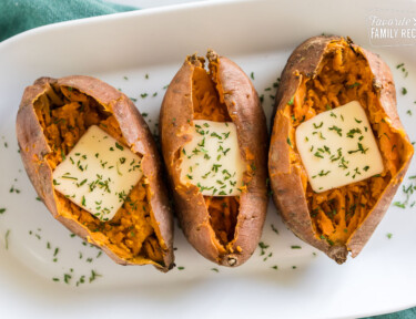 Sweet Potatoes baked in the instant pot with butter on a plate