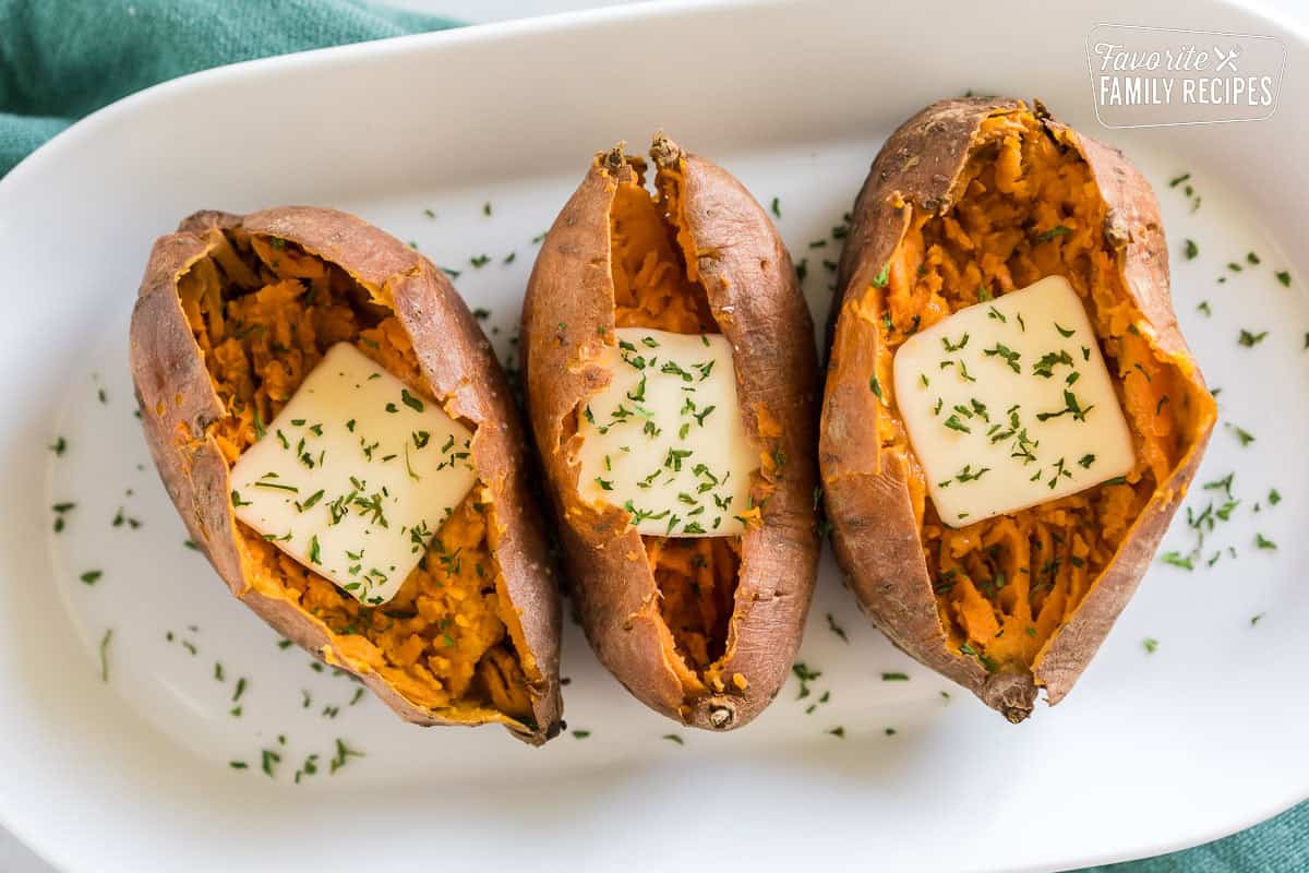 Sweet Potatoes baked in the instant pot with butter on a plate