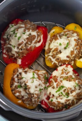 Melted cheese on Stuffed Bell Peppers in the Instant Pot.