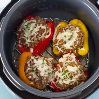 Melted cheese on Stuffed Bell Peppers in the Instant Pot.
