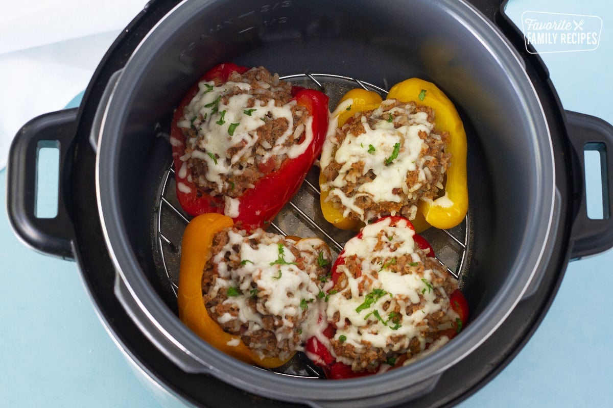 Melted cheese on Stuffed Bell Peppers in the Instant Pot.