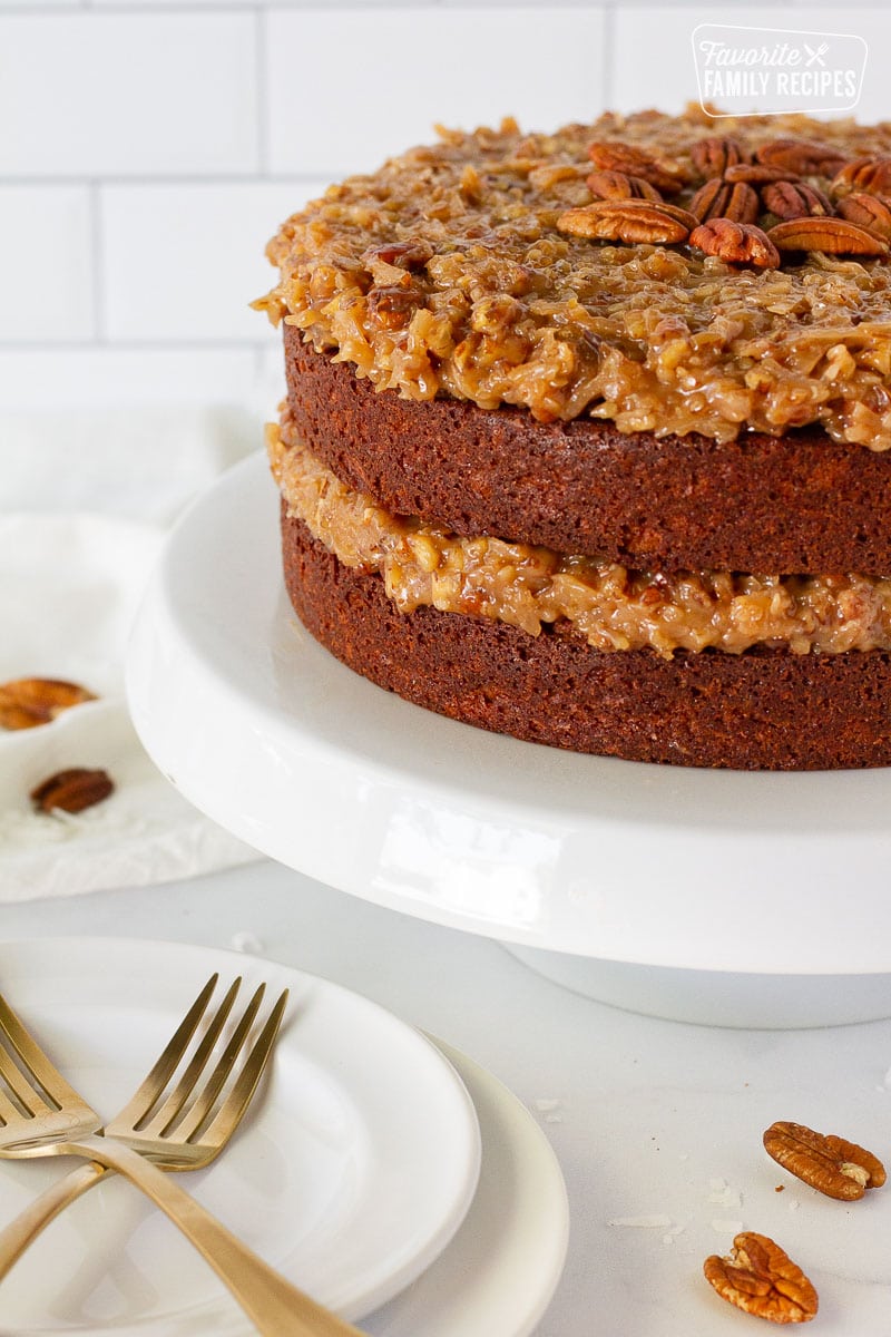 Side view of German Chocolate Cake on a cake platter.