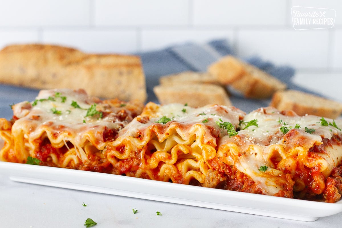 Plate of three Lasagne Roll Ups side by side.