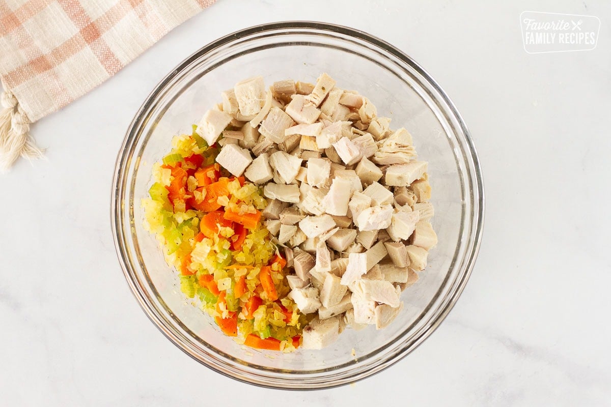 Bowl of cut up turkey and cooked vegetables for the filling of Easy Turkey Pot Pie.