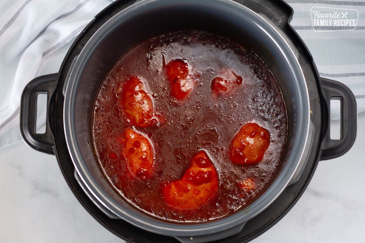 Six servings of cooked Instant Pot Apricot Chicken in the Instant Pot.