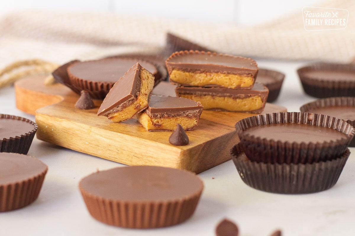 Homemade Reese's Peanut Butter Cups sliced and stacked.