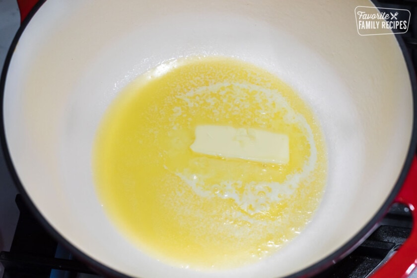 Butter being melted in a pot on the stove