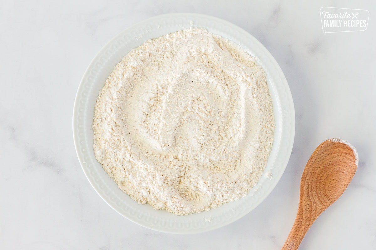 Bowl of flour mixture for Green Bean Casserole onions.