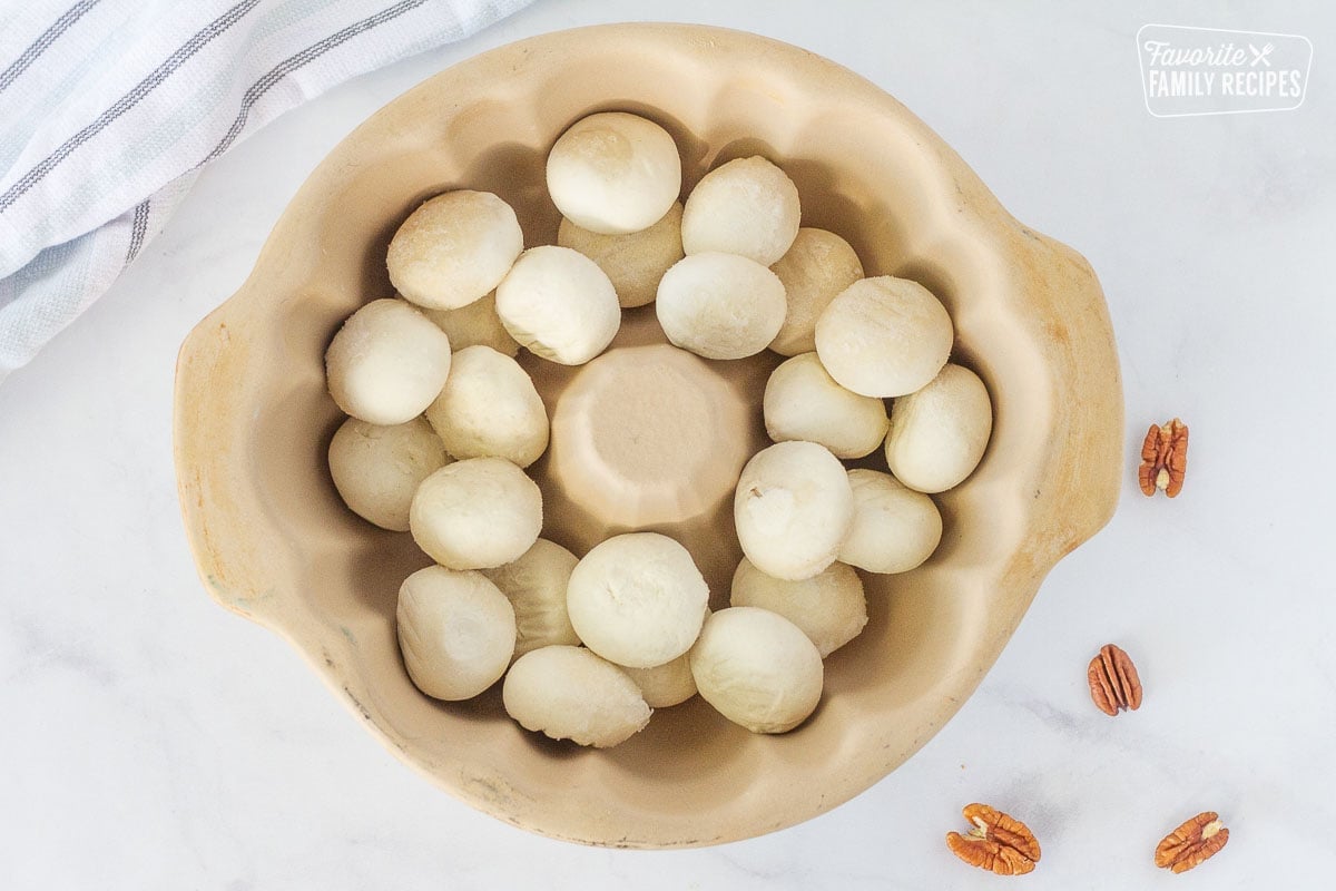 Bundt pan with frozen dinner rolls for Easy Monkey Bread.