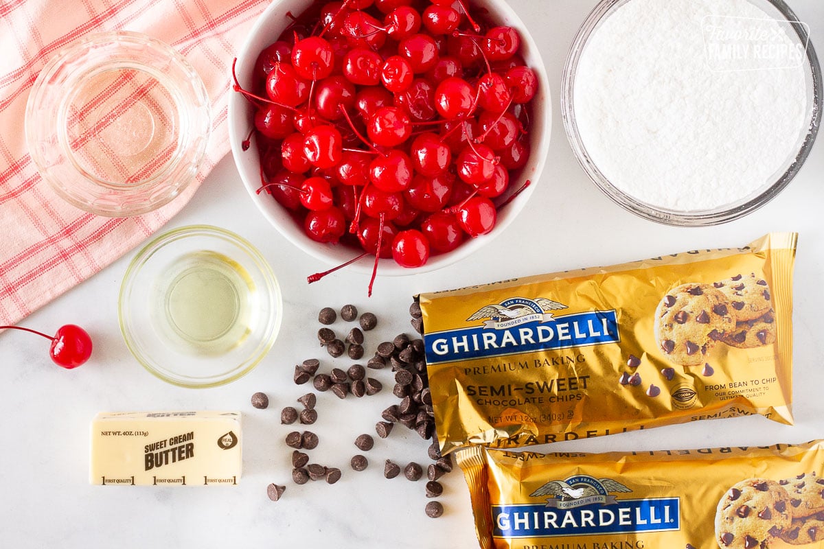 Chocolate chips, cherries, sugar, syrup, oil and butter to make Chocolate Covered Cherries.